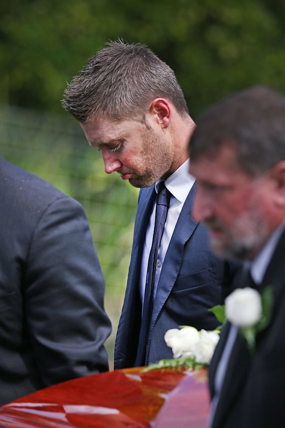 Australian cricket captain Michael Clarke carries the coffin during the Funeral Service for Phillip Hughes.