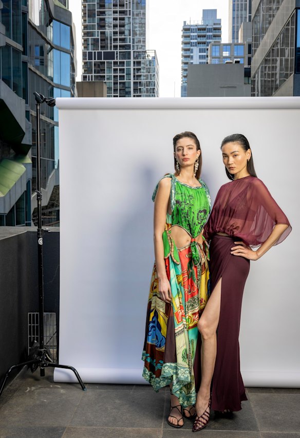 Models Bela Palcio and Trang Nguyen wearing outfits by Australian designers Alemais and Bianca Spender, respectively. 