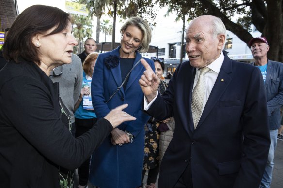 John Howard walks with Liberal candidate for Warringah Katherine Deves through Manly Corso today.