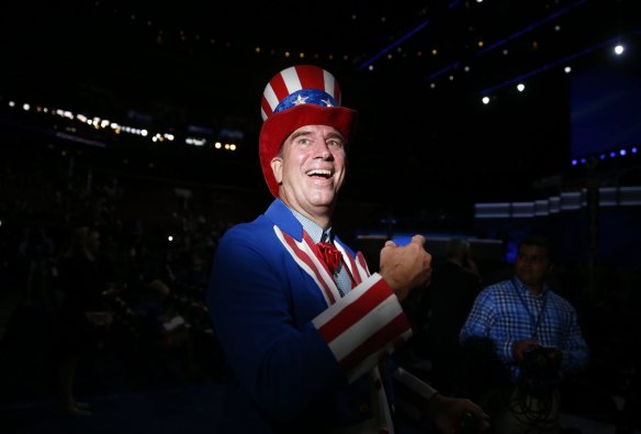 A delegate dressed as Uncle Sam smiles during the Democratic National Convention in Philadelphia on Monday.