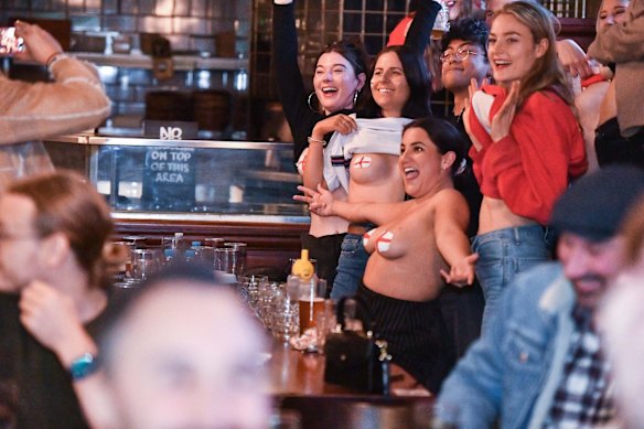 English soccer fans gather at Turf Sports Bar in Melbourne in the early hours of the morning to watch the Euro 2020 final between England and Italy being played at Wembley Stadium in London.