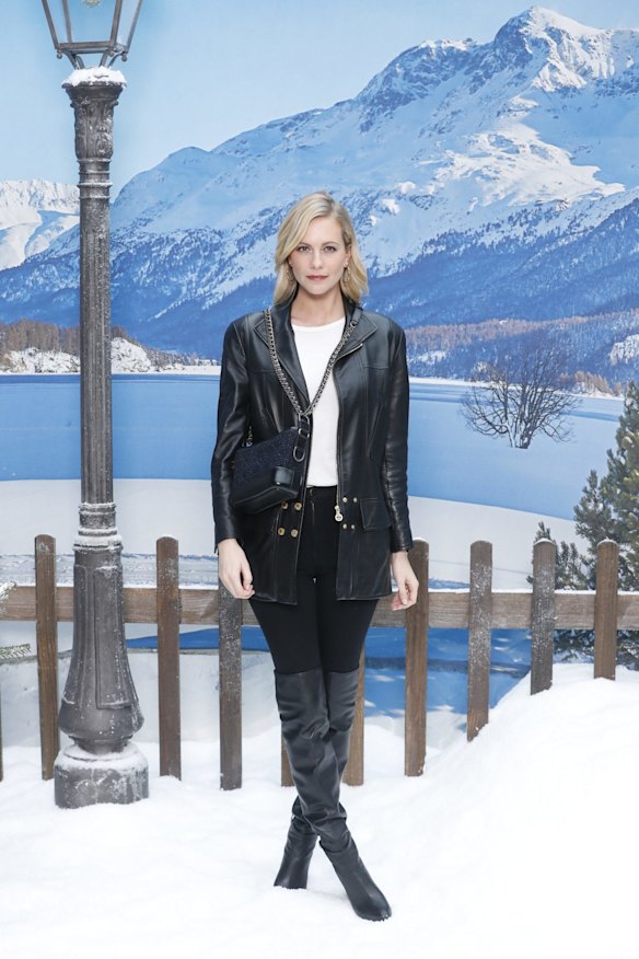 Model Poppy Delevingne poses for photographers upon arrival at the Chanel ready to wear Fall-Winter 2019-2020 collection, that was presented in Paris, Tuesday, March 5, 2019. (AP Photo/Thibault Camus)