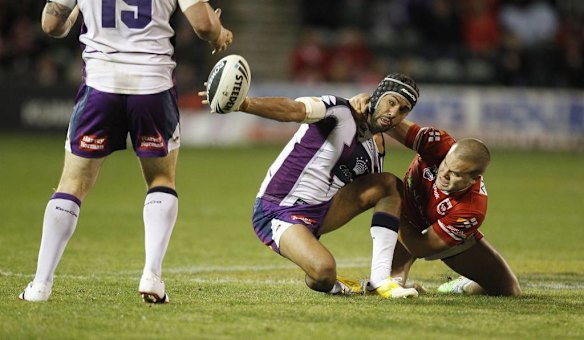 Storm Dane Nielsen is caught by Dragons Dan Hunt.