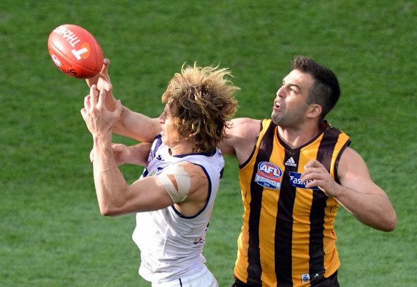 Fremantle's Nathan Fyfe is spoilt by Brian Lake.