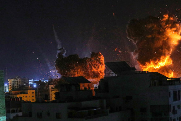 Israeli planes strike a government building in Gaza City on May 18. 