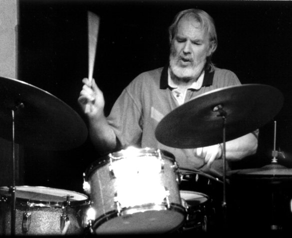 John Pochee played a right-handed drum kit left-handed.
