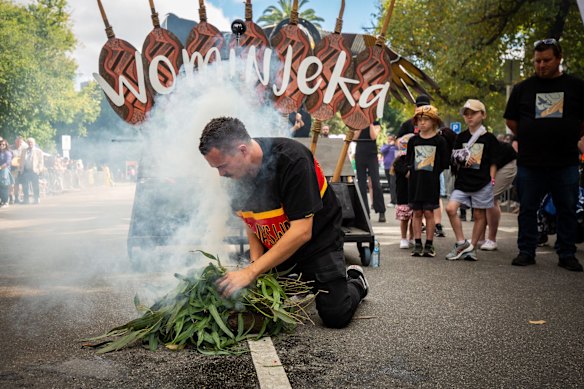 Elders and members of the Wurundjeri Woi-Wurrung community perform a smoking ceremony at the  Moomba Parade