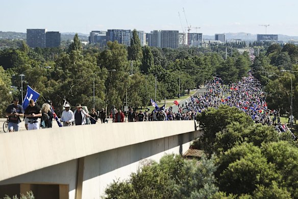 'Convoy to Canberra' protesters march towards the Parliamentary triangle, in Canberra.