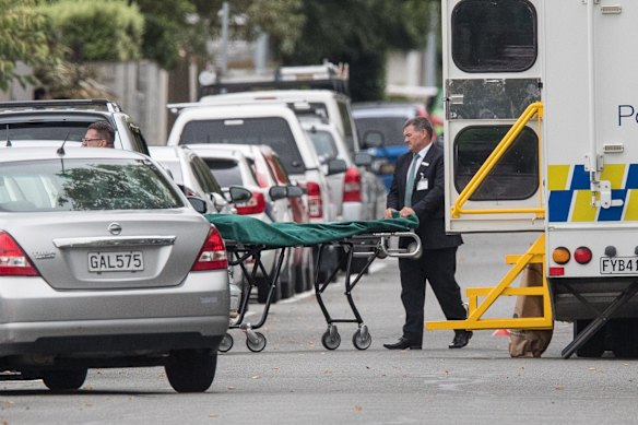 Body trolleys being wheeled in.