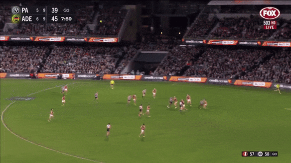 Port Adelaide’s Dan Houston faces scrutiny for a high bump on Adelaide’s Izak Rankine.