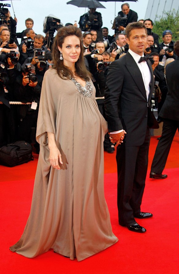 Angelina Jolie and Brad Pitt arrive for the premiere of the film <em>Changeling</em> at the 61st International film festival in Cannes in 2008. 