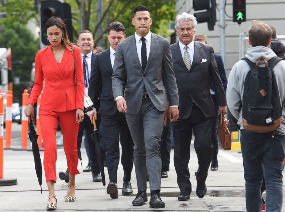 Israel Folau and his wife Maria arrive for mediation on Monday morning.