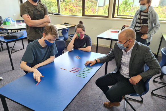 Templestowe College principal Peter Ellis with maths students earlier this year. 