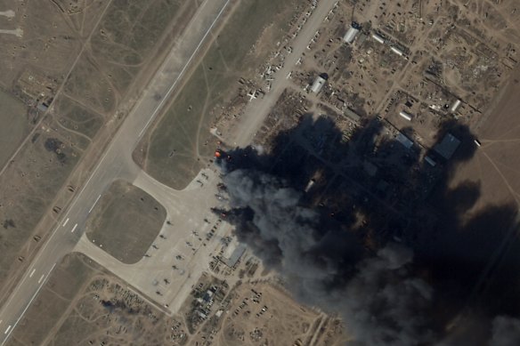 A satellite image shows fire and smoke at the Russian-controlled Kherson airport in Ukraine after a  suspected Ukrainian strike.