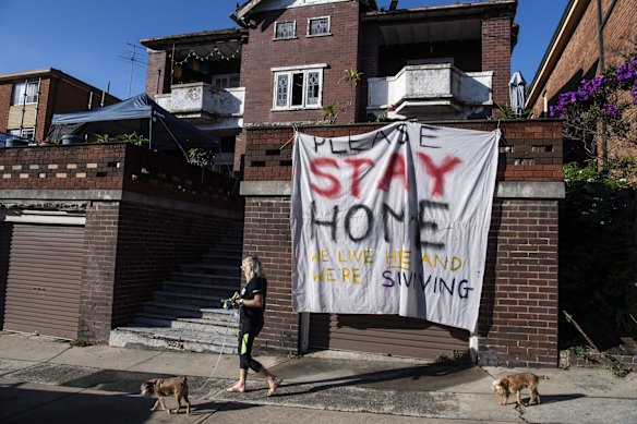 A 'Stay Home signage' on a block of apartments on Clovelly Rd, Clovelly. 