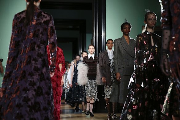 Models wear creations by Erdem at the Autumn/Winter 2018 runway show in London.