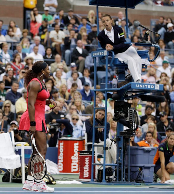 Serena Williams reacts while talking to chair umpire Eva Asderaki during the women's championship match against Samantha Stosur of Australia at the US Open.