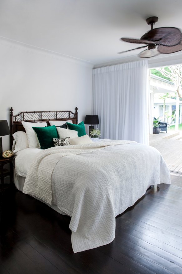 “We love falling into bed – it’s a beautiful sanctuary space with a tropical feel,” says Alanna. The ceiling fan is from myfan.com.au.