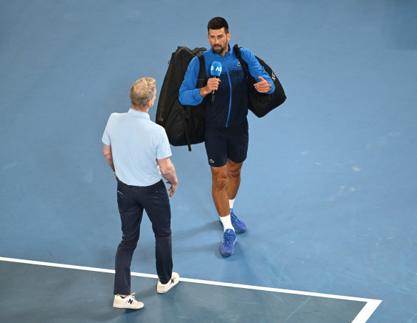 Novak Djokovic speaks to fans post match.