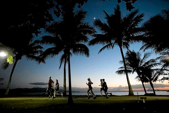 Opposition Leader Tony Abbott starts the day with an early morning run up Castle Hill in Townsville.