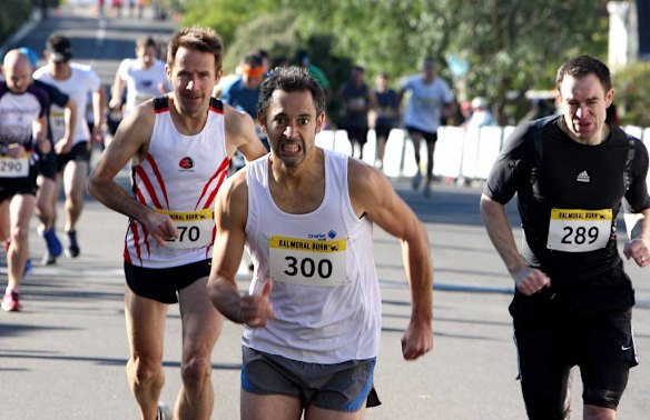 The Humpty Dumpty Foundation's Balmoral Burn run. The male/female ages 30-39 Competitors make their way up the hill.
