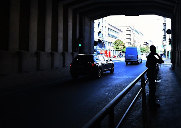A refugee stands waiting to gain access to a local Italian ngo that is assisting refugees at the rear of  Milan Central Train Station. Some refugees have been taken to reception centres, some sleep in the parks and streets surrounding the station.