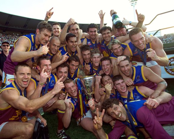 The Lions celebrate the 2001 premiership.