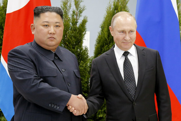  Russian President Vladimir Putin, right, and North Korea's leader Kim Jong Un shake hands during their meeting in Vladivostok.