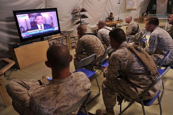 US Marines watch President Barack Obama announce the death of Osama bin Laden.