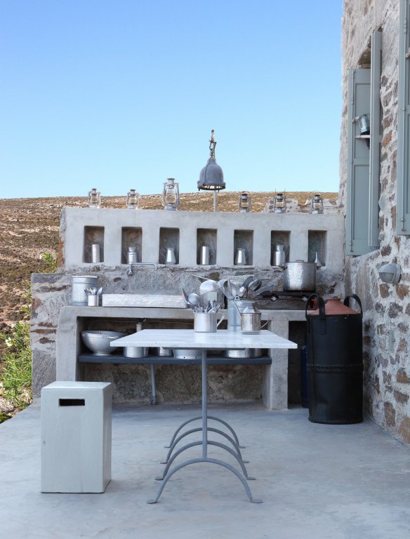 The outdoor kitchen takes advantage of the climate and the views.