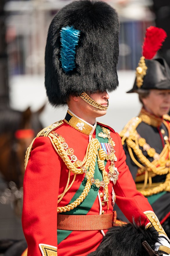 Prince William, the Duke of Cambridge, in his role as Colonel of the Irish Guards, rides his horse along the Mall during the royal procession ahead of the Trooping the Colour parade.