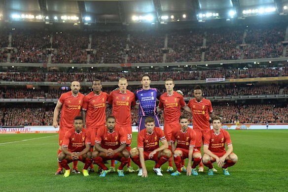 The Liverpool team pose for a team photo before the game.