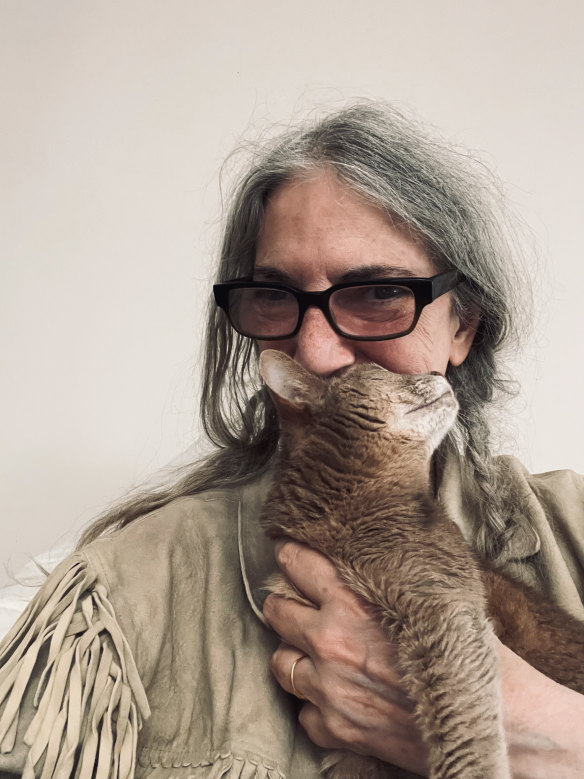 Smith helping her Abyssinian 
cat, Cairo, celebrate its 21st birthday on November 15.