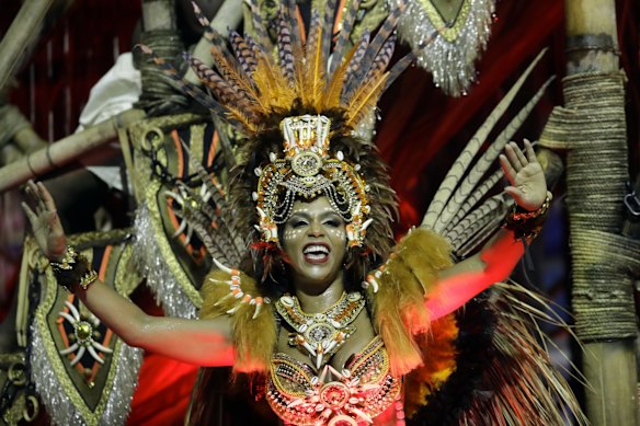 A dancer from the Aguia de Ouro samba school performs during a carnival parade in Sao Paulo, Brazil.