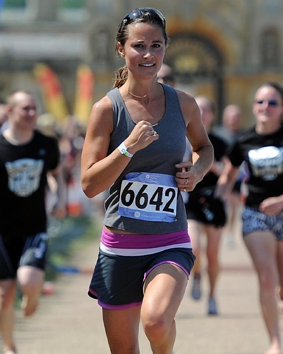 Pippa Middleton approaches the finish line during the GE Blenheim Triathlon at Blenheim Palace on June 4, 2011