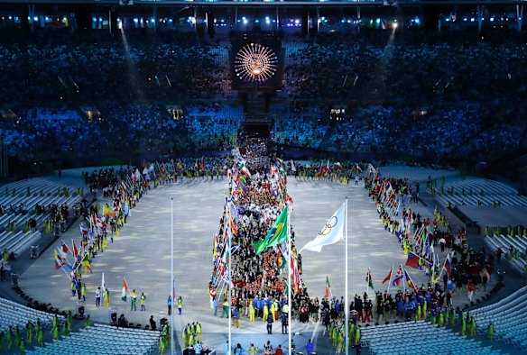 A parade of athletes enters the closing ceremony in the Maracana stadium at the 2016 Summer Olympics in Rio de Janeiro, Brazil.