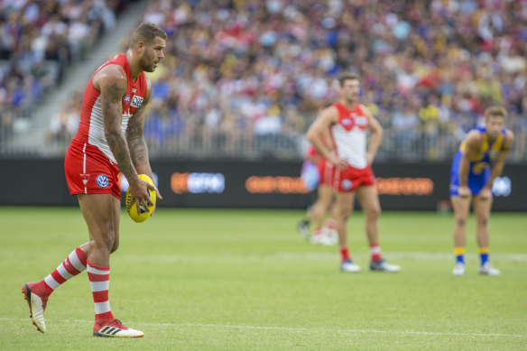 Lance "Buddy" Franklin lines up a goal during the Swans' round 1 game against West Coast. Swans management claim the star player's injury woes began at that game, and have pinned the blame on Optus Stadium's playing surface.