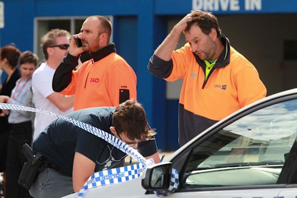 Police take statements from those at the scene.