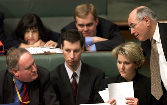 Tony Smith (back middle) with other Liberal advisers and Prime Minister John Howard including top left Nicki Sava, Tony Nutt, Gary Dawson and Ann Duffield in 2001.

