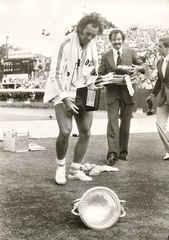 The trophy juggle becomes too much for the victorious Edmondson.