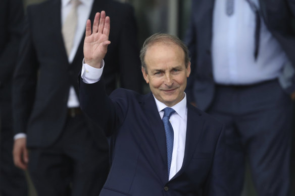 Fianna Fail party leader Micheal Martin leaves the Dail government in Dublin, where he has been officially elected as the new Irish prime minister.