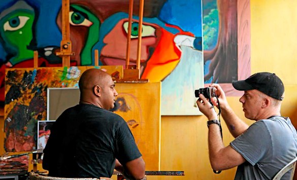 Bali Nine member Myuran Sukumaran is interviewed by Fairfax correspondent Michael Bachelard regarding the visit to Kerobokan jail by Australian artist Ben Guilty.