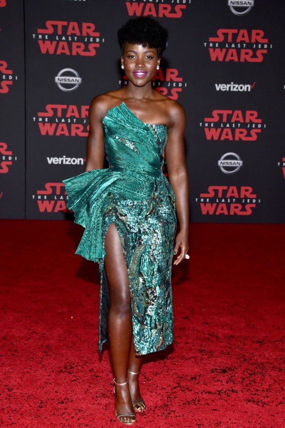 Bold sparkle in jewelled tones, as seen on Lupita Nyong'o, is shaping as the hottest red carpet trend of the moment.