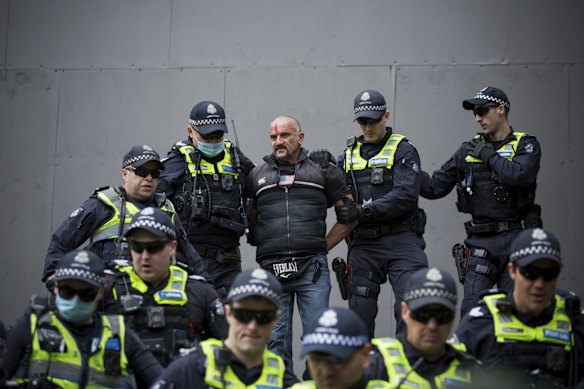 Ten people have been arrested in dramatic scenes after dozens of protesters gathered at Parliament House in Melbourne.