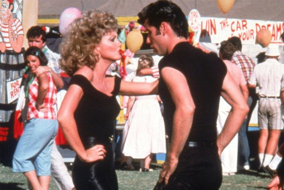 Olivia Newton-John as Sandy playing opposite John Travolta as Danny in Grease.
