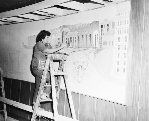 Margaret Olley paints a mural at the NSW Rugby Leagues Club in Sydney on 12 June 1957.