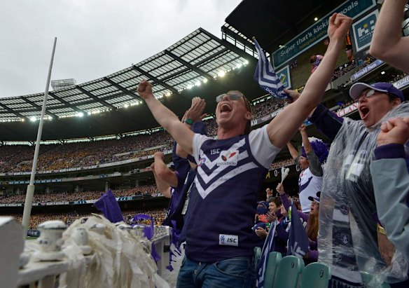 Fans celebrate Fremantle's first goal.