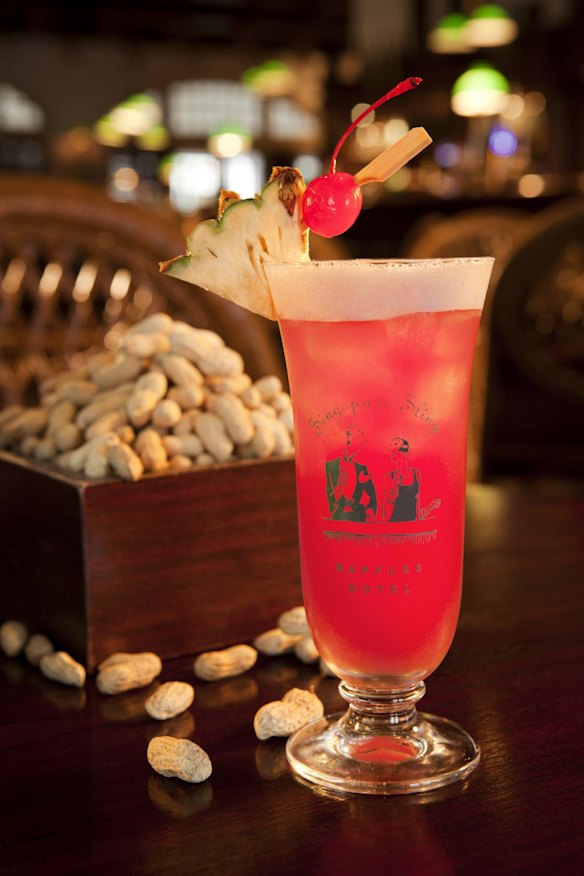 Top tipple : Raffles’ Singapore Sling with its regulation peanuts