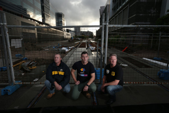 The Newcastle light rail project will be disrupted. From left, Brad McDougall, ETU organiser; Cory Wright, AMWU assistant state secretary; and Justin Page, ETU assistant state secretary.