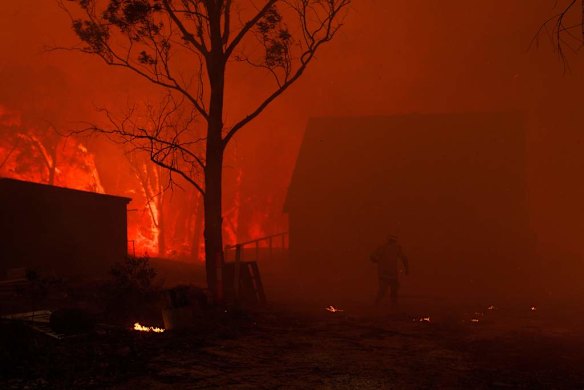 NSW RFS Crews struggle to save a home near Dargan on the Bells Line of Road.